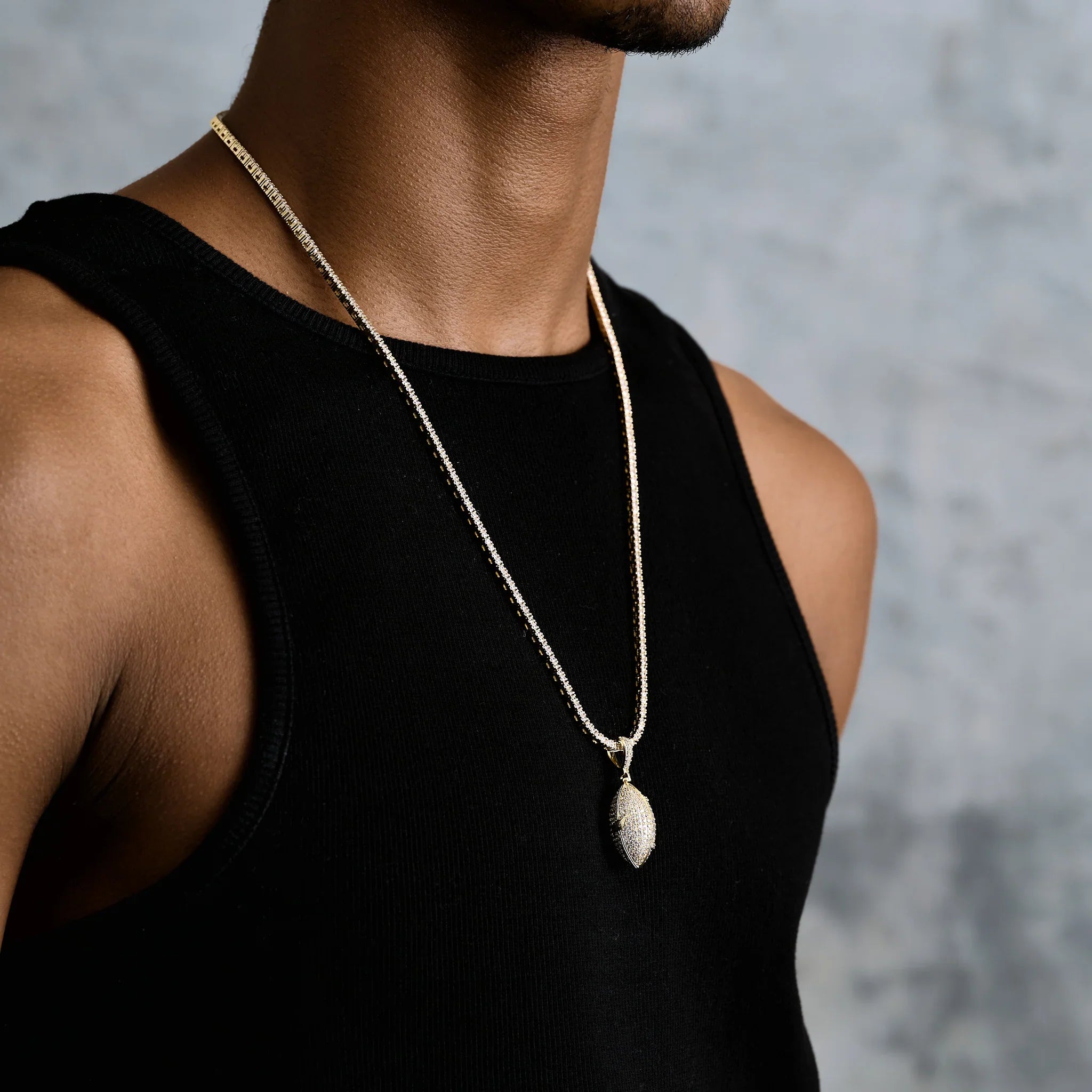 Iced Football Pendant in Yellow Gold